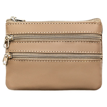 Skórzane etui na klucze Beżowa kluczówka saszetka z kieszonkami.